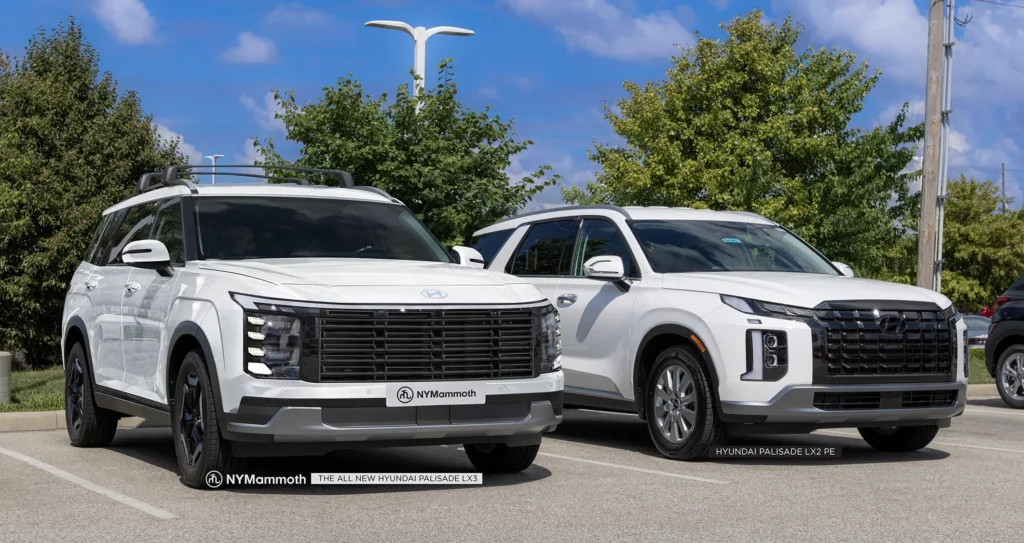 Dos camionetas Hyundai Palisade blancas estacionadas al aire libre.